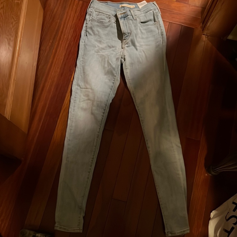 Levi High Rise Super Skinny light colored jeans-size 25 (size 2)
